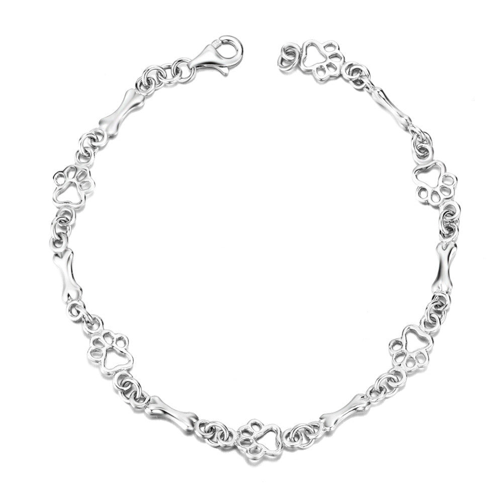 Aurembiaix® | Pulsera Charm Huella y Hueso en Plata