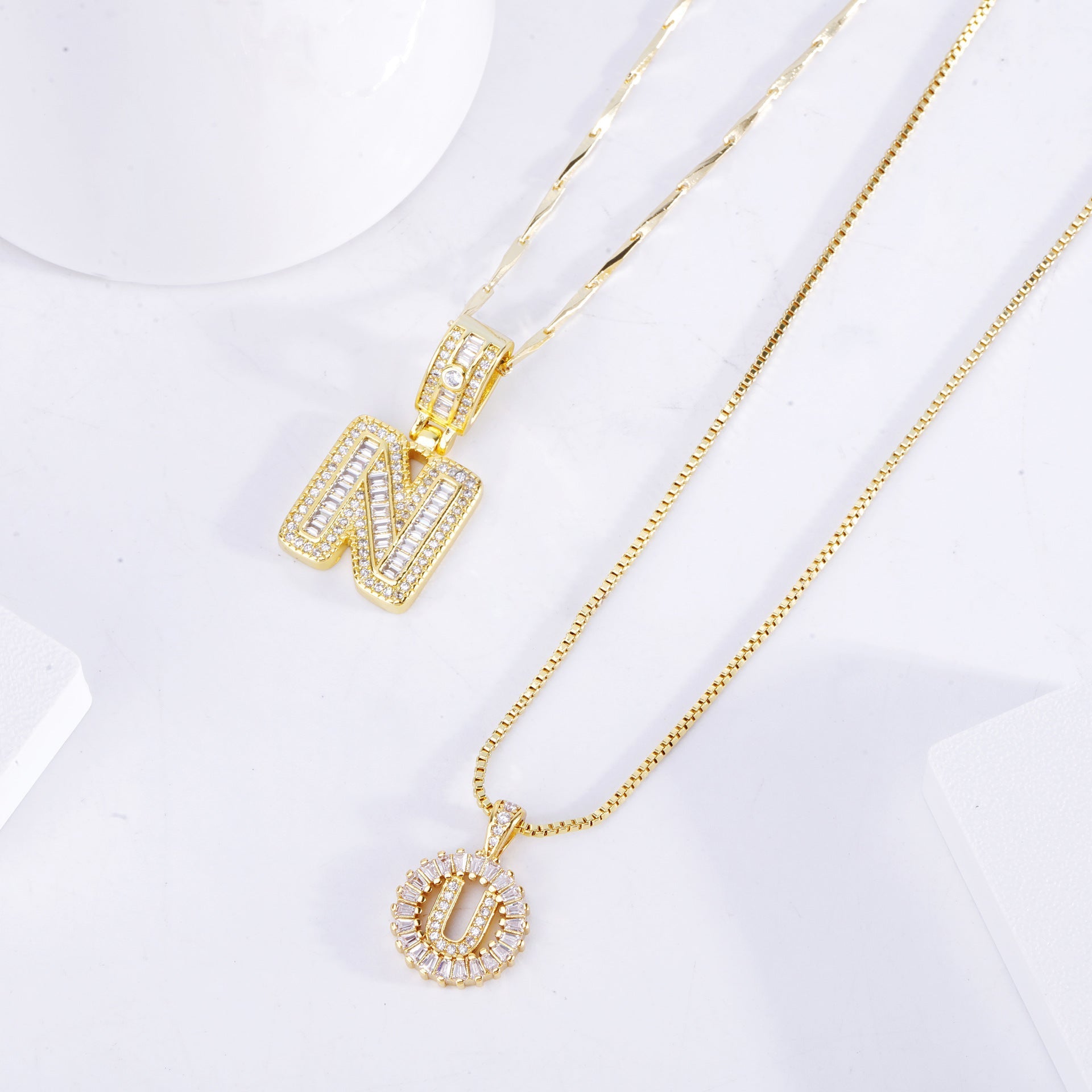Set de collares con inicial pavé | Oro